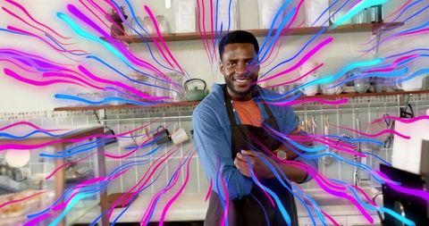 Smiling Barista in Coffee Shop with Dynamic Digital Art