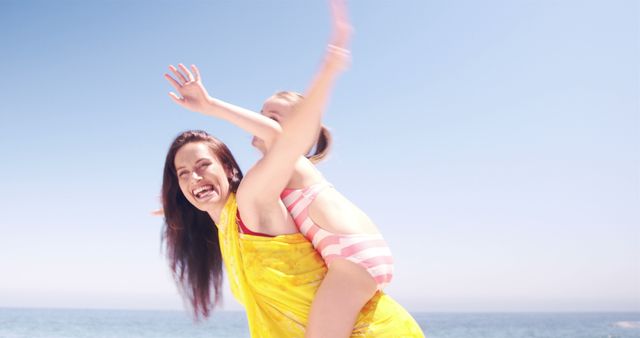 Mother and Daughter Having Fun at the Beach During Summer - Download Free Stock Images Pikwizard.com