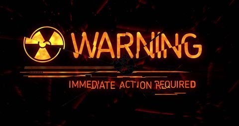 Glowing warning with biohazard symbol against dark background