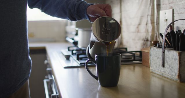 Morning Routine Pouring Coffee in Cozy Kitchen - Download Free Stock Images Pikwizard.com