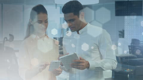 Business Team Analyzing Data with Digital Tablets in Modern Office