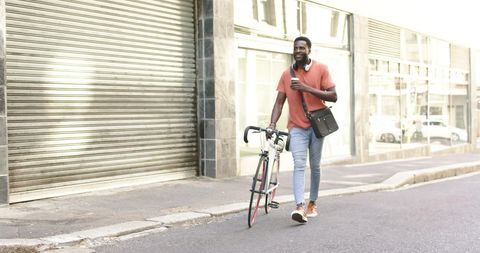 Casual city stroll with bicycle and coffee