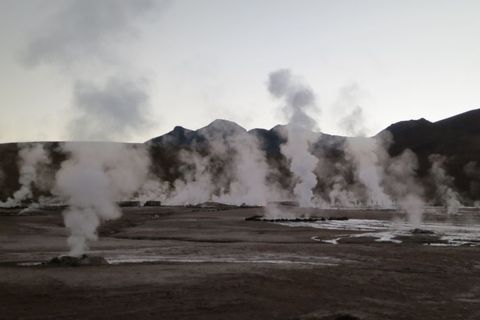 Majestic Geysers at Sunrise Sending Steam into the Air