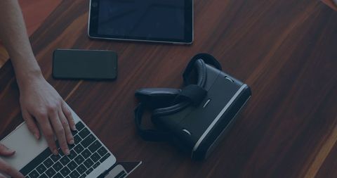 Hands on Laptop with VR Headset and Tablet on Desk - Download Free Stock Images Pikwizard.com