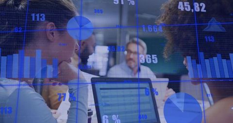 Diverse Team Collaborating Over Data Dashboard with Laptop, Graphs, Spreadsheets Overlay