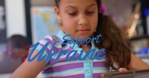 Young girl in classroom supporting ukraine awareness