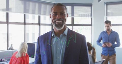 Confident Businessman Smiling in Contemporary Office Environment