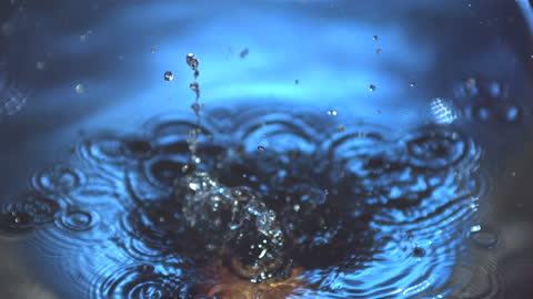 Apple Splashing in Clear Water Captured in Slow Motion