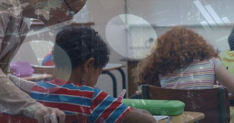 Teacher Assisting Student with Learning and Technology Integration