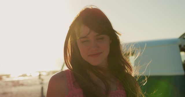 Woman Enjoying Sunset at Beachside - Download Free Stock Images Pikwizard.com