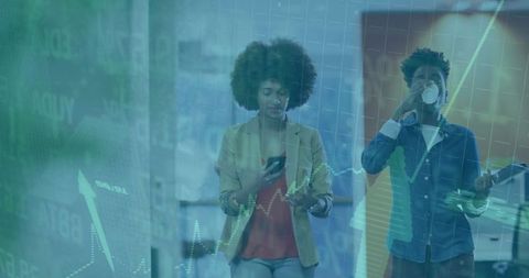 Business Professionals with Stock Market Overlay in Modern Corporate Office