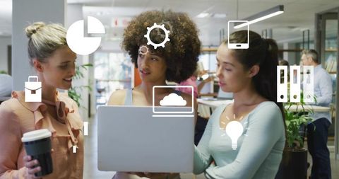 Young Professional Women Collaborate in Modern Office Space