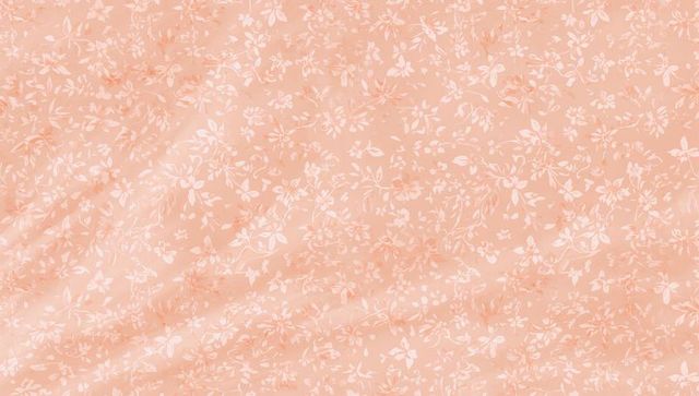 Peach pink floral fabric texture with white allover motif and soft creases