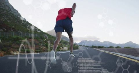 Male athlete sprinting on mountain road with fitness hud overlays and performance data