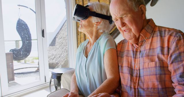 Elderly Couple Exploring Virtual Reality in Living Room - Download Free Stock Images Pikwizard.com