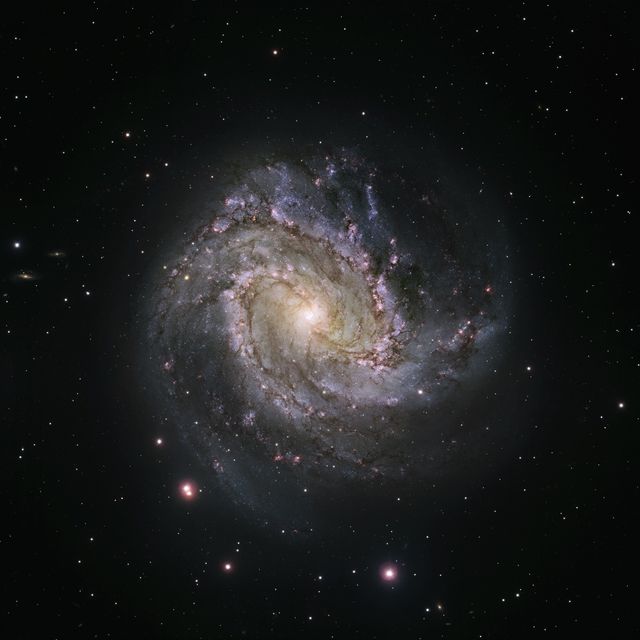Spiral Galaxy with Bright Core and Spiraling Arms in Deep Space - Download Free Stock Photos Pikwizard.com