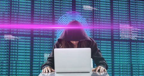Hacker in Hoodie Engaging with Digital Code Projections - Download Free Stock Images Pikwizard.com
