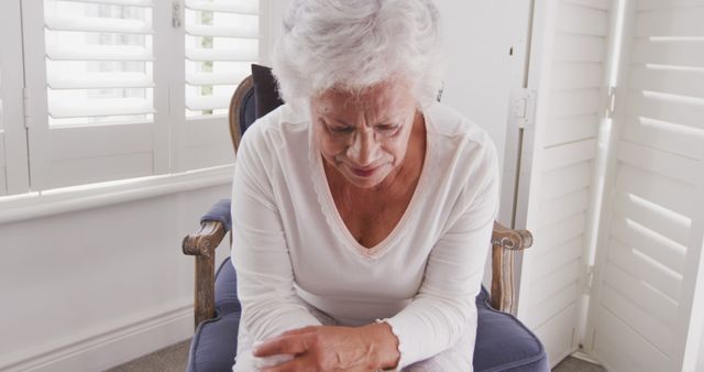 Senior Woman Suffering from Arthritis Pain at Home - Download Free Stock Images Pikwizard.com