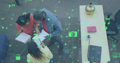 High Angle View of Networking Technology in Office Team Meeting