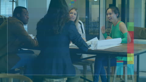 Diverse Team Collaborating on Business Strategies with Digital Overlays