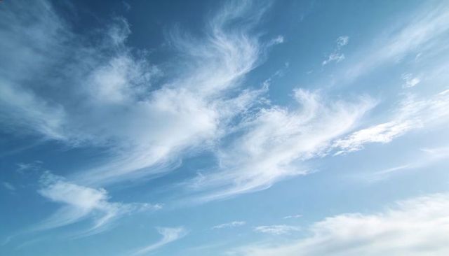 Cirrus Clouds Stretching Across Clear Blue Sky, Wispy High-Altitude Streaks and Gradient