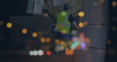 Delivery Worker Organizing Packages Amid City Nightlights