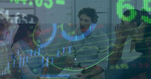 Business Team Analyzing Stock Market Data in Dynamic Meeting