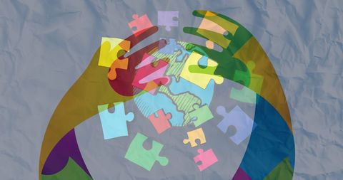 colorful puzzle pieces surround globally embracing hands - Download Free Stock Images Pikwizard.com