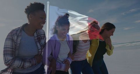 Group of Friends Enjoying a Beach Walk with French Flag Overlay