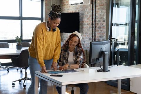 Creative Colleagues Collaborating in Modern Office