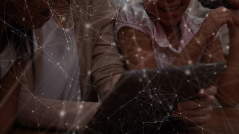 Diverse Students and Teacher Exploring Digital Tablet Network