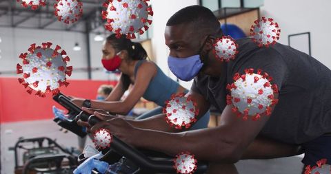 Masked Fitness Enthusiasts Exercising Amidst Derived COVID-19 Threat