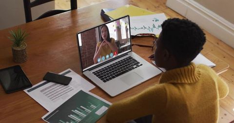 Professional Attending Virtual Meeting in Home Office