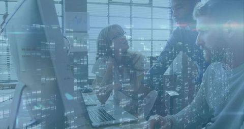 Team Collaboration on Digital Project in Modern Office