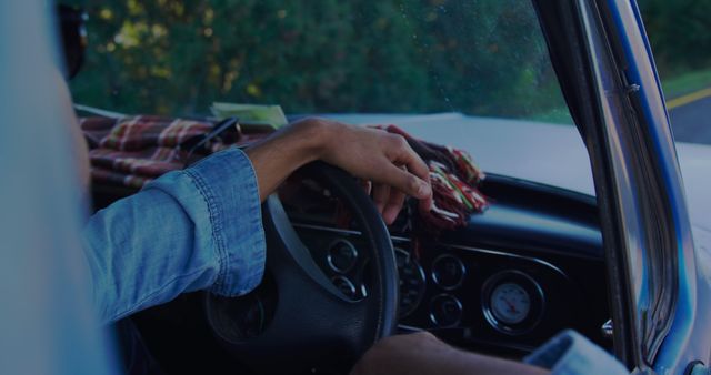 Close up of driver in vintage car on a scenic road trip - Download Free Stock Images Pikwizard.com