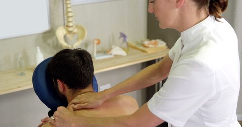 Therapist Administering Back Massage Therapy - Download Free Stock Images Pikwizard.com