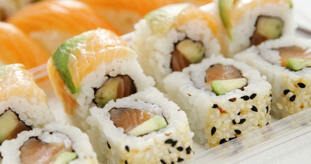 Close-Up Shot of Sushi Rolls with Diverse Fillings and Toppings - Download Free Stock Images Pikwizard.com