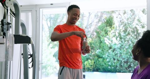 Couple Exercising Home Gym Focused Healthy Lifestyle