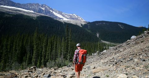 Solo Hiker Trekking Through Mountainous Wilderness - Download Free Stock Images Pikwizard.com
