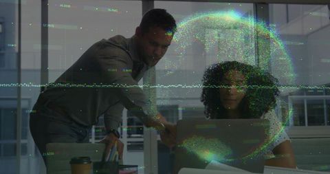 Professionals Collaborating with Digital Data in Modern Office