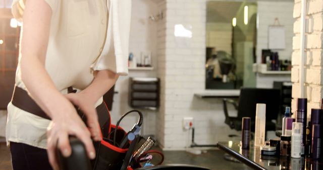 Hairdresser Setting Up Tools in Modern Salon - Download Free Stock Images Pikwizard.com