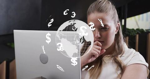 Young professional analyzing global finance on laptop with floating currency symbols and globe