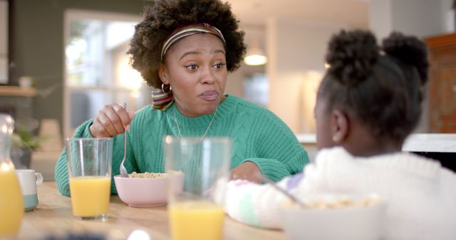 Mother and Daughter Enjoying Breakfast and Bonding at Home - Download Free Stock Images Pikwizard.com