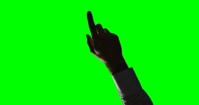Silhouette of Hand Showing Middle Finger Against Green Background - Download Free Stock Images Pikwizard.com
