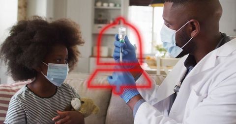 Healthcare professional providing pediatric vaccine to child with toy