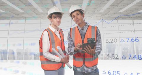 Engineers Analyzing Digital Data with City Skyline Background - Download Free Stock Images Pikwizard.com