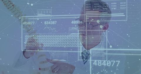 Doctor analyzing digital data with spinal model