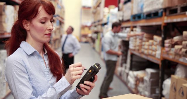 Female Warehouse Manager Scanning Barcode in Storage Area - Download Free Stock Images Pikwizard.com