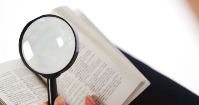 Reading Book with Magnifying Glass - Download Free Stock Images Pikwizard.com