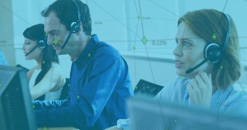 Customer service team using headsets collaborating in modern office